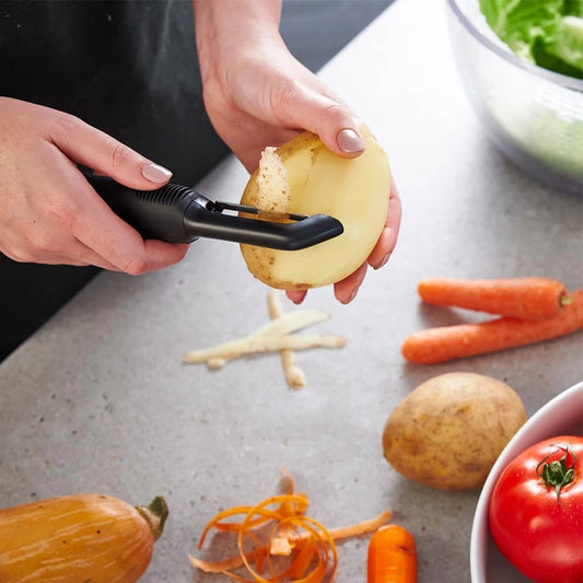 éplucheur de légumes facilitant